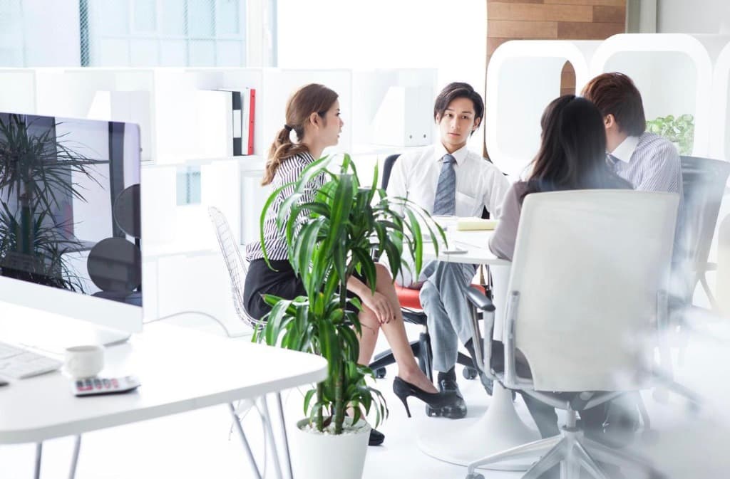 Seven Oak Prestige professional team conducting a client consultation
